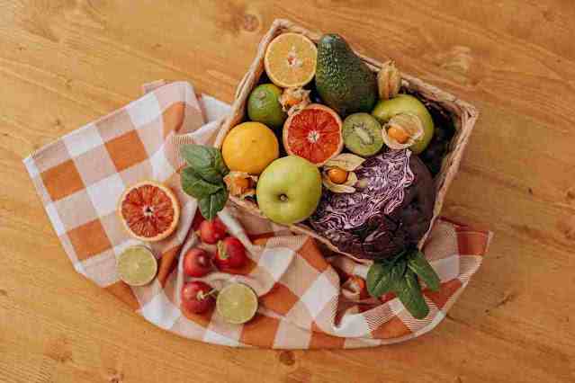 a basket of fruits and vegetables on a table
পিরিয়ড হলে কি খাওয়া উচিত
